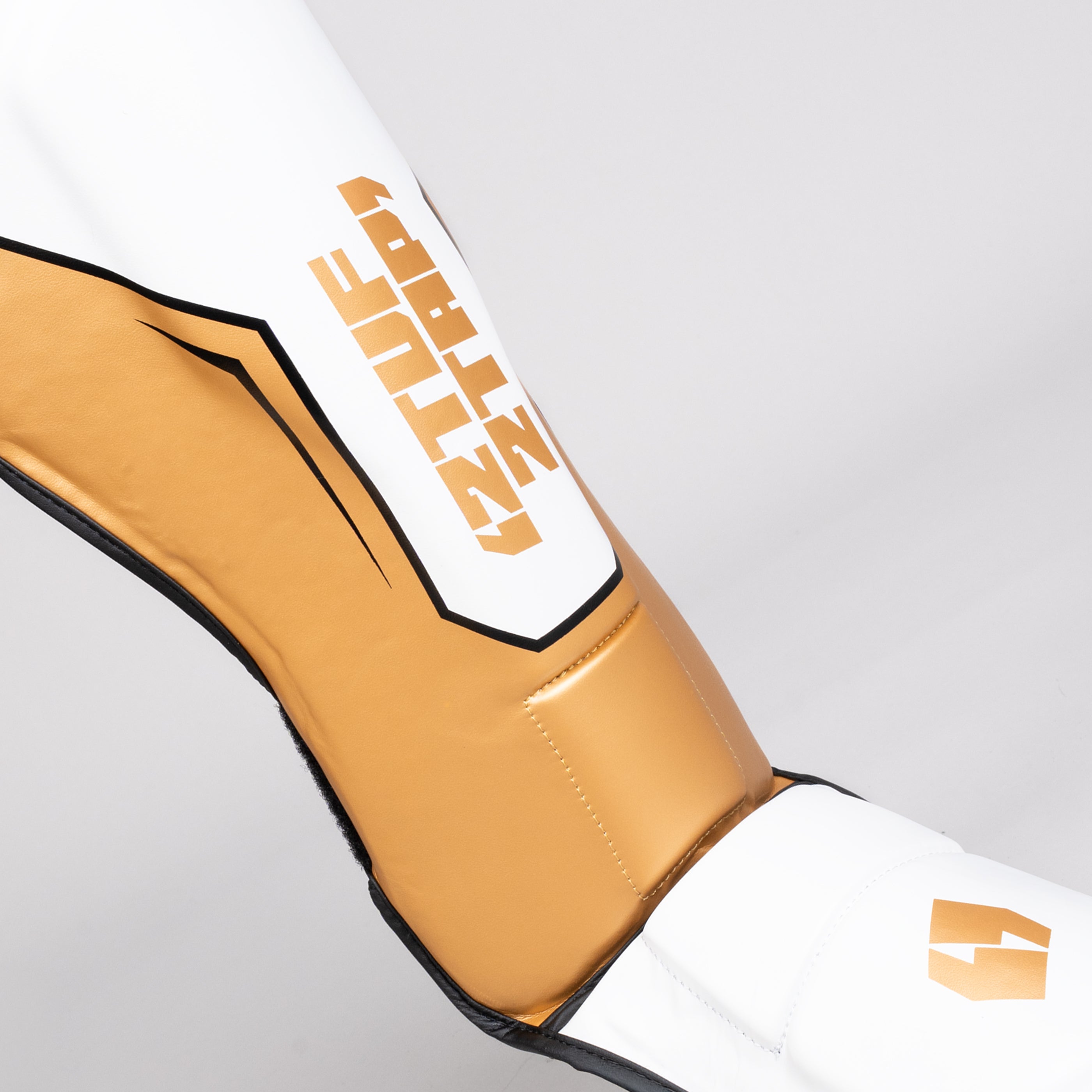 'Jalmood' Shin Instep Guards - White/Gold 'Jalmood' Shin Instep Guards - White/Gold