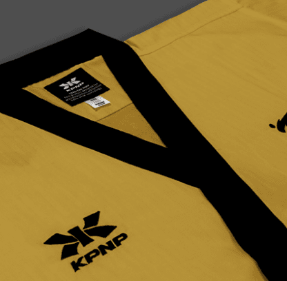 KPNP 'Grandmaster' Taekwondo Uniform – Gold/Black – World Taekwondo Approved KPNP 'Grandmaster' Taekwondo Uniform – Gold/Black – World Taekwondo Approved