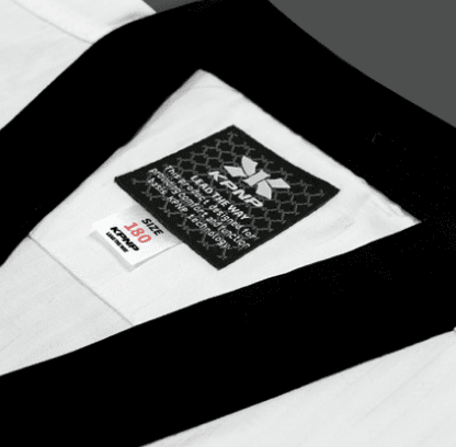 KPNP 'Poomsae' Taekwondo Dobok Uniform | Dan - Men's White/Black KPNP 'Poomsae' Taekwondo Dobok Uniform | Dan - Men's White/Black