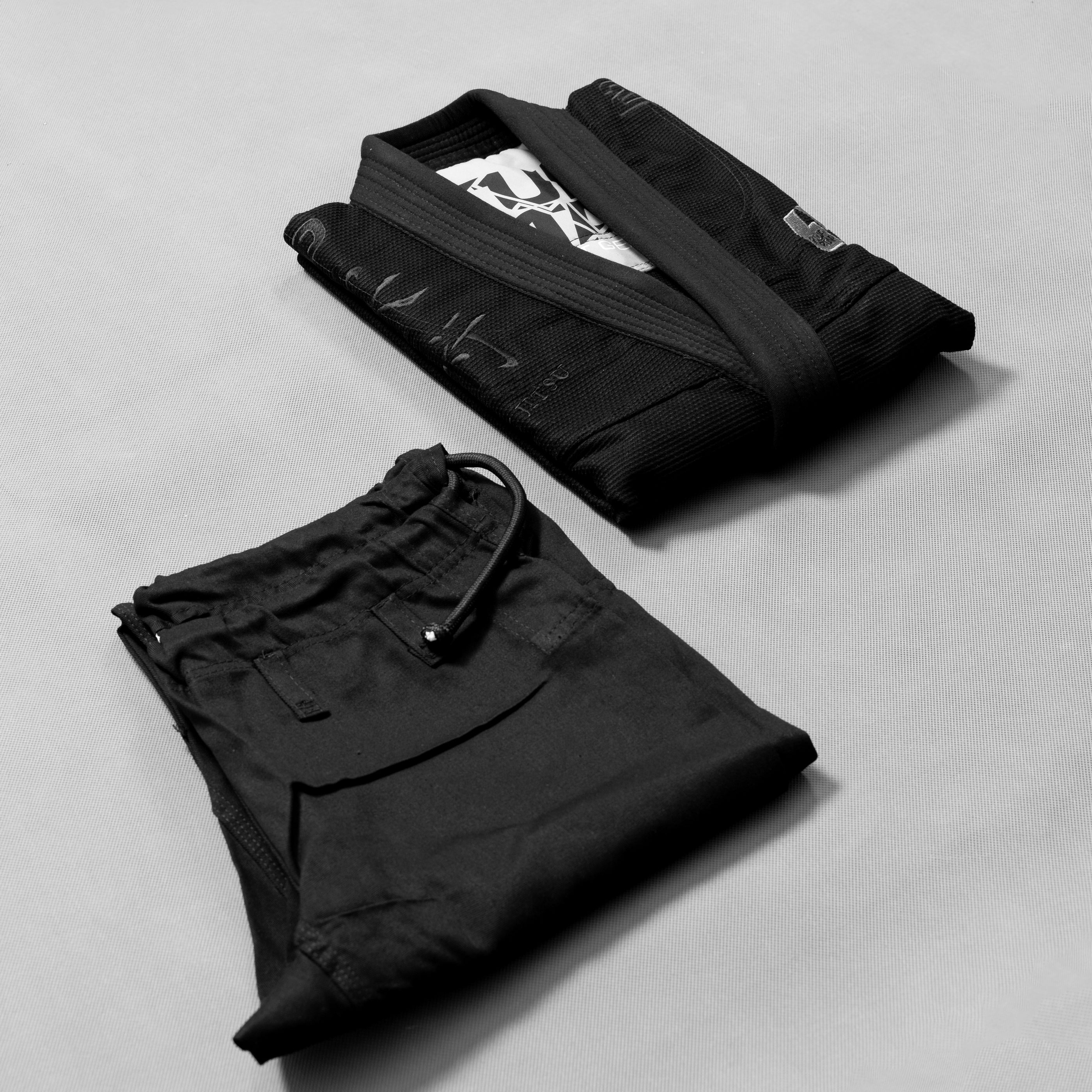 Elevate Your Training with the 'Bridge' Jiu-Jitsu Gi Uniform - Black/Silver