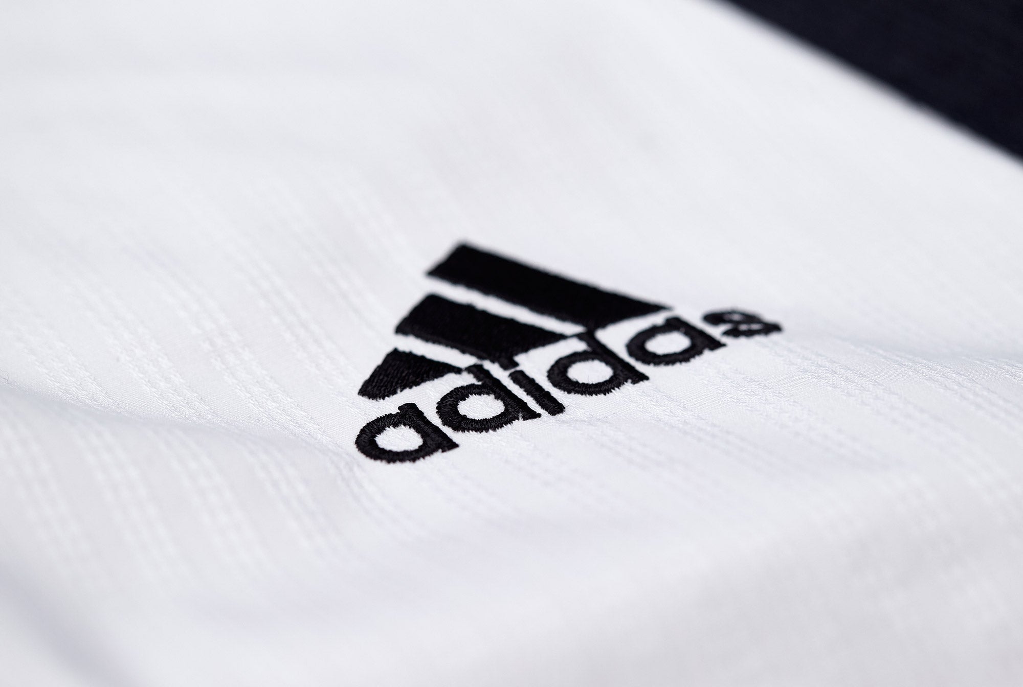 Adidas 'Poomsae' Taekwondo Dobok Uniform | Dan - Men - White/Black Adidas 'Poomsae' Taekwondo Dobok Uniform | Dan - Men - White/Black