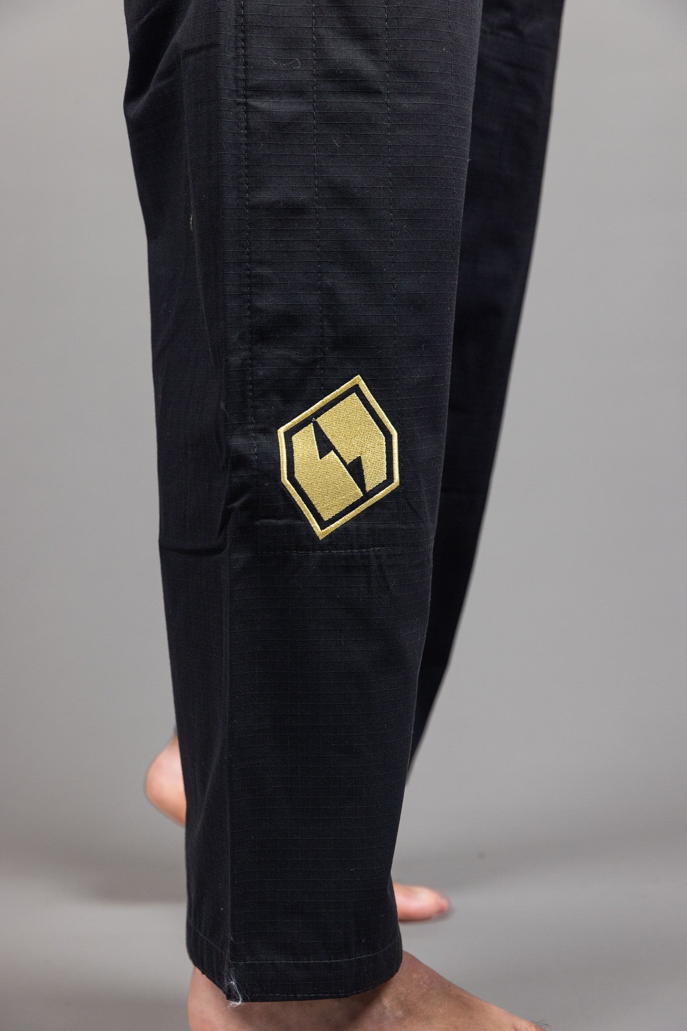 FirstLine' BJJ Uniform Black Gold FirstLine' BJJ Uniform Black Gold