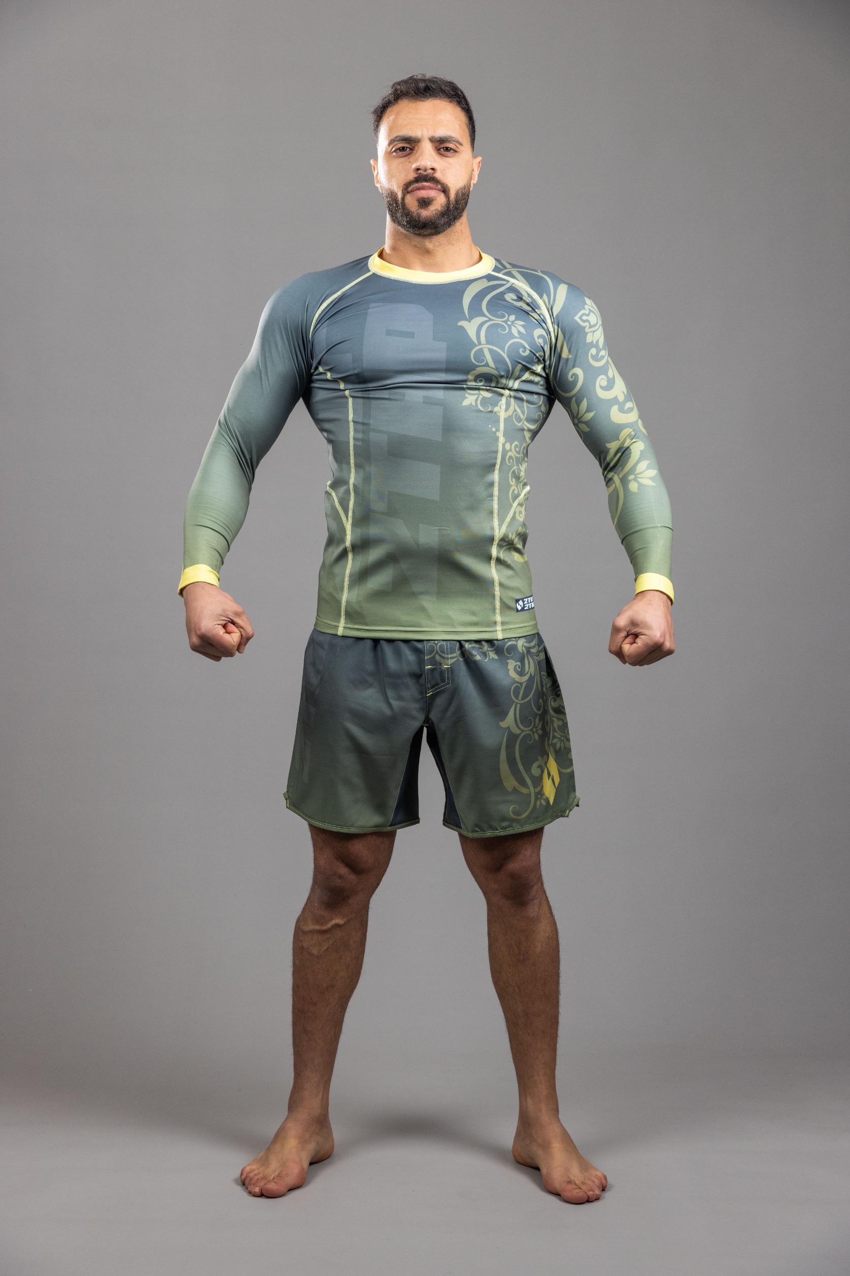 Petra Rose' MMA Rash Guard LS Black Gold Petra Rose' MMA Rash Guard LS Black Gold