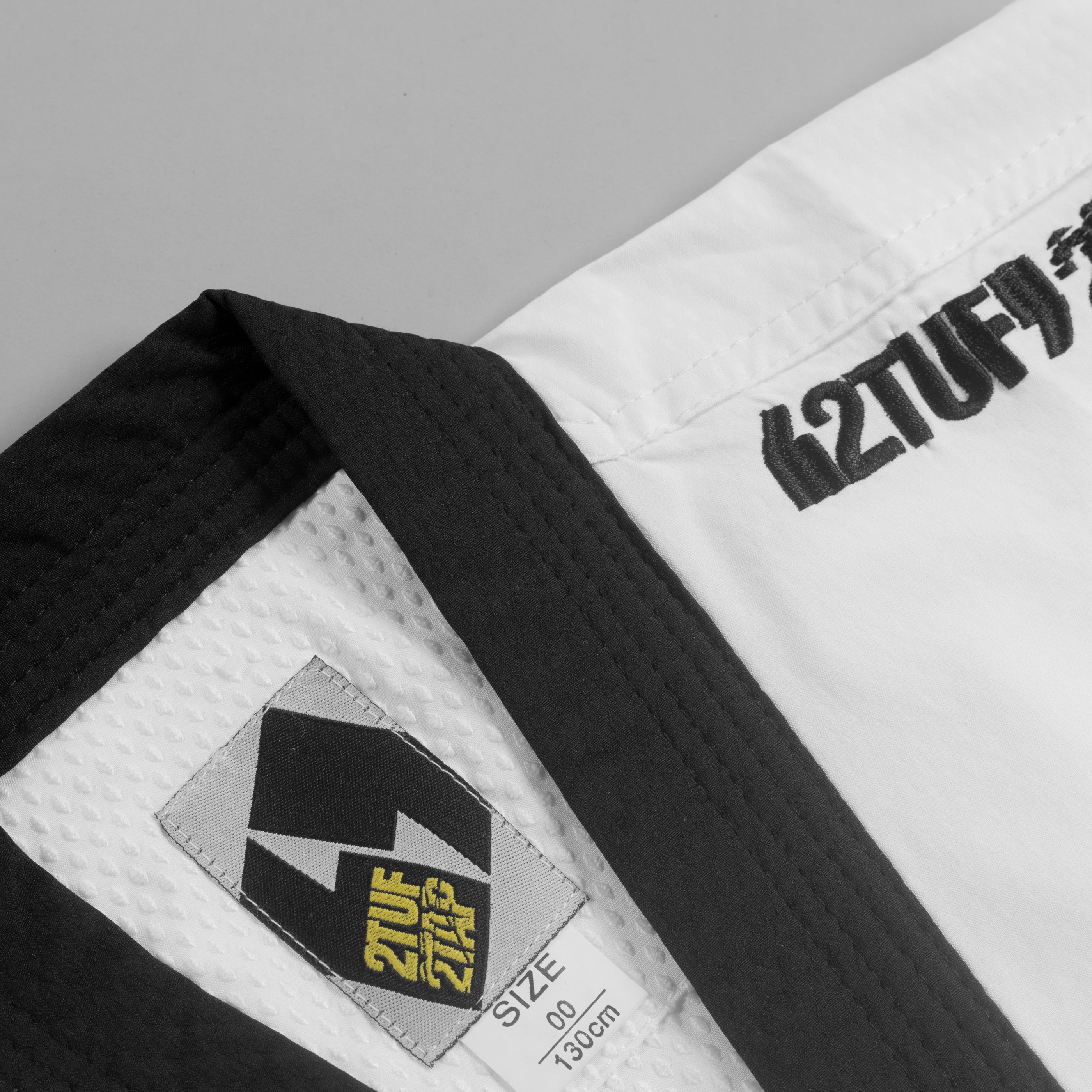 'Fighter' Taekwondo Dobok Uniform - White/Black 2TUF2TAP