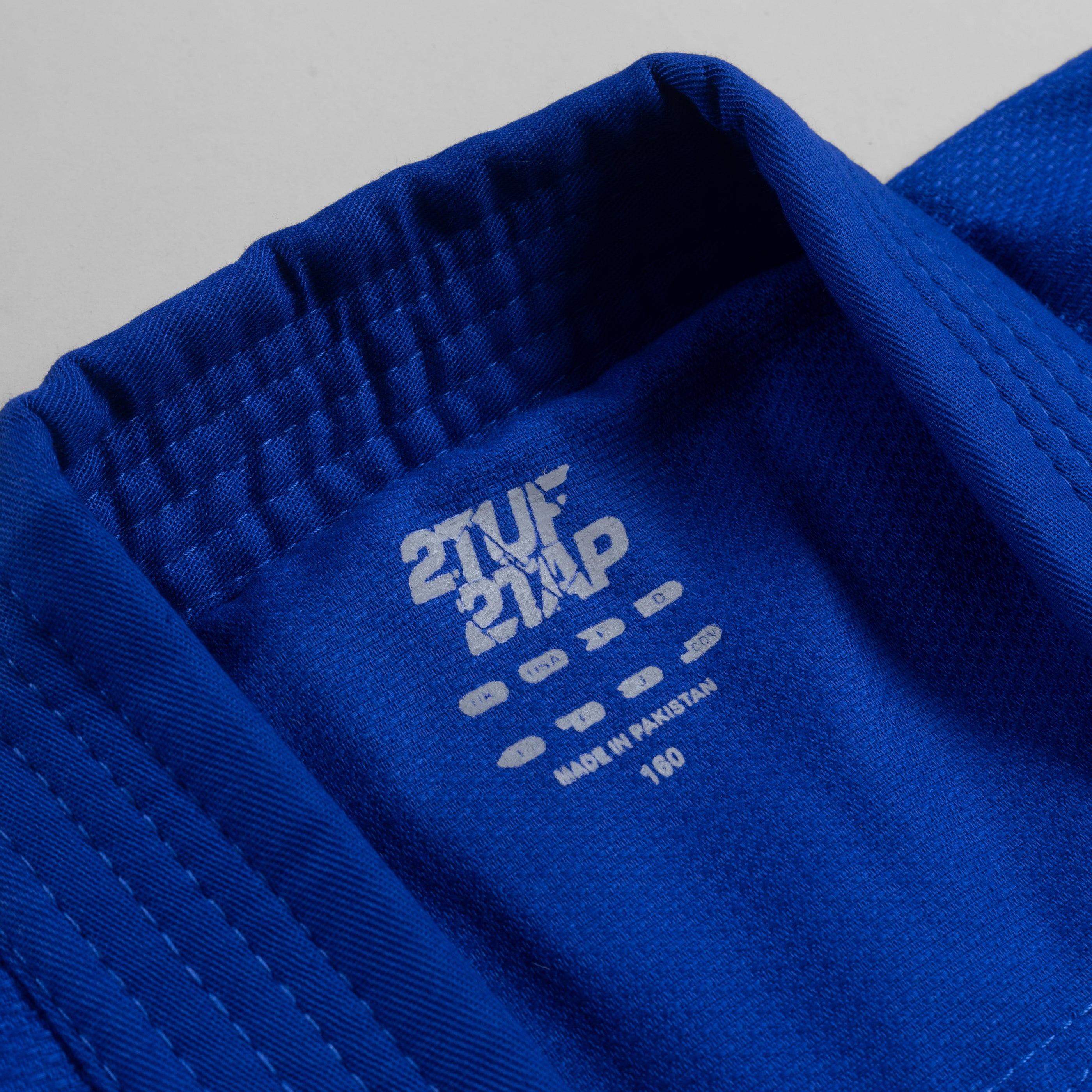 'Sukasu' Judo Uniform - Judogi - 250 Grams - Blue/White 2TUF2TAP